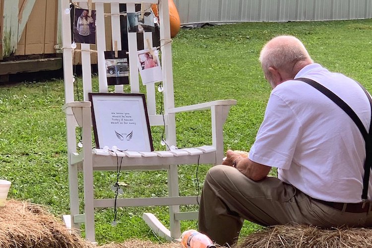 grandfather eats alone at memorial set up for dead wife at granddaughter's wedding