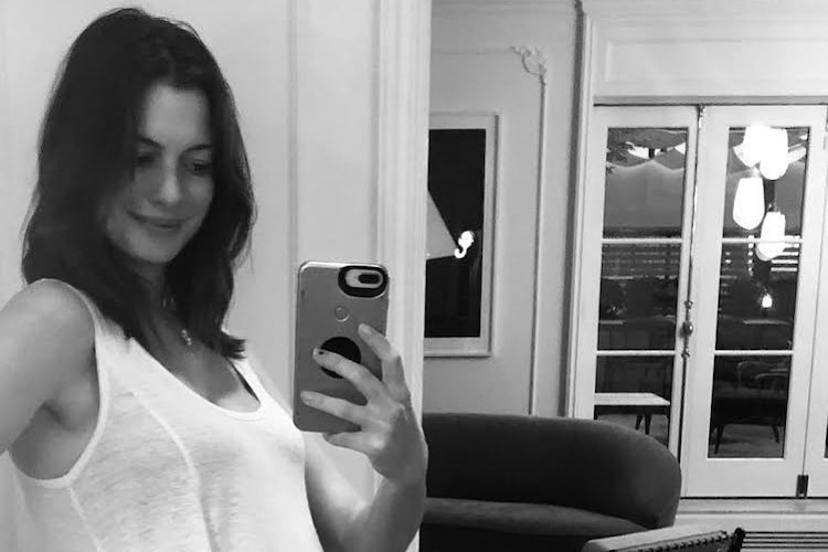 Anne Hathaway Debuts Baby Bump in Cut-Out Dress