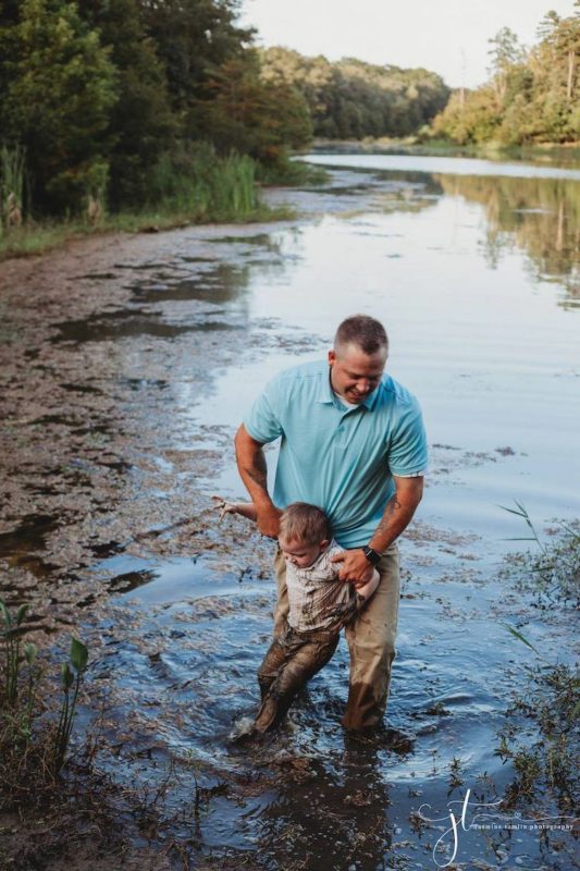 toddler walks into pond in middle of family photo shoot