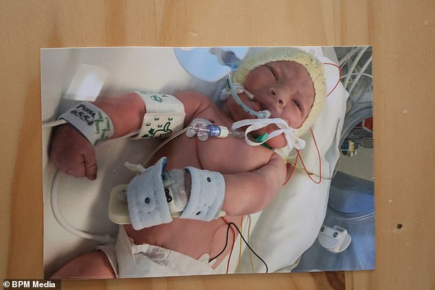 unresponsive baby opens eyes just as parents say their final goodbyes and doctors turn off life support