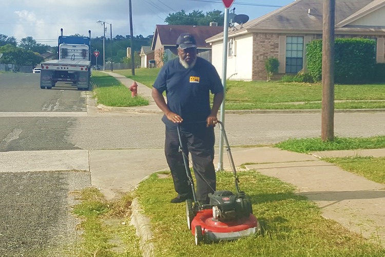 Jerry Martin: Bus Driver Mows Tall Grass and Weeds at Bus Stop for Local Children