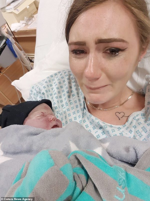mother shares raw photo of her holding stillborn baby, blames midwives who allegedly ignored her pleas about her "high-risk" pregnancy