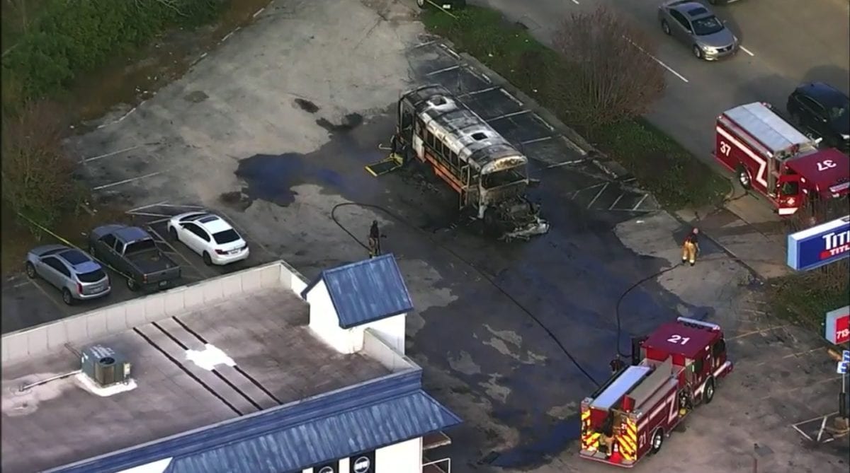 school bus with student in wheelchair on board bursts into flames