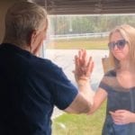 Newly Engaged Woman Surprises Grandpa In Quarantine Through Nursing Home Window