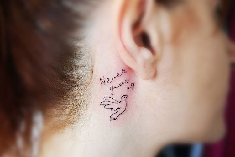 35 subtle neck tattoos that will make you think, 'oh, maybe i *could* pull one off...'