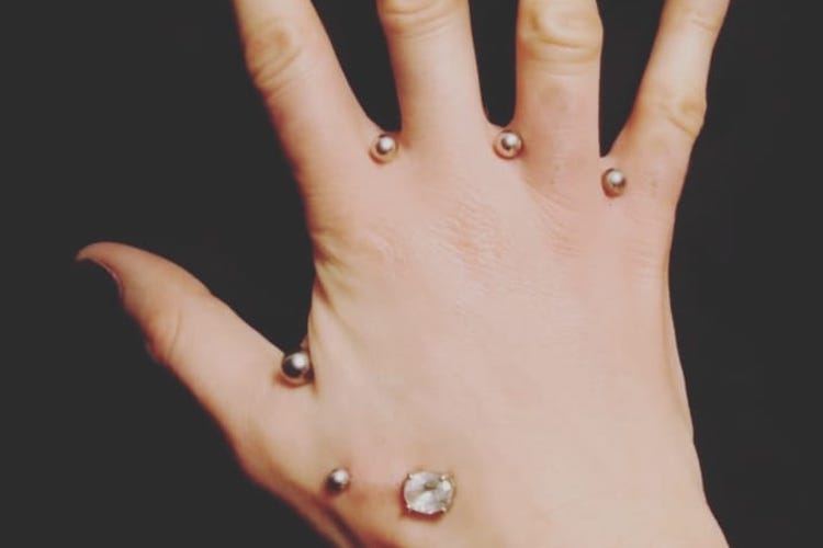 25 Hand Piercings That Are Completely Out Of Hand