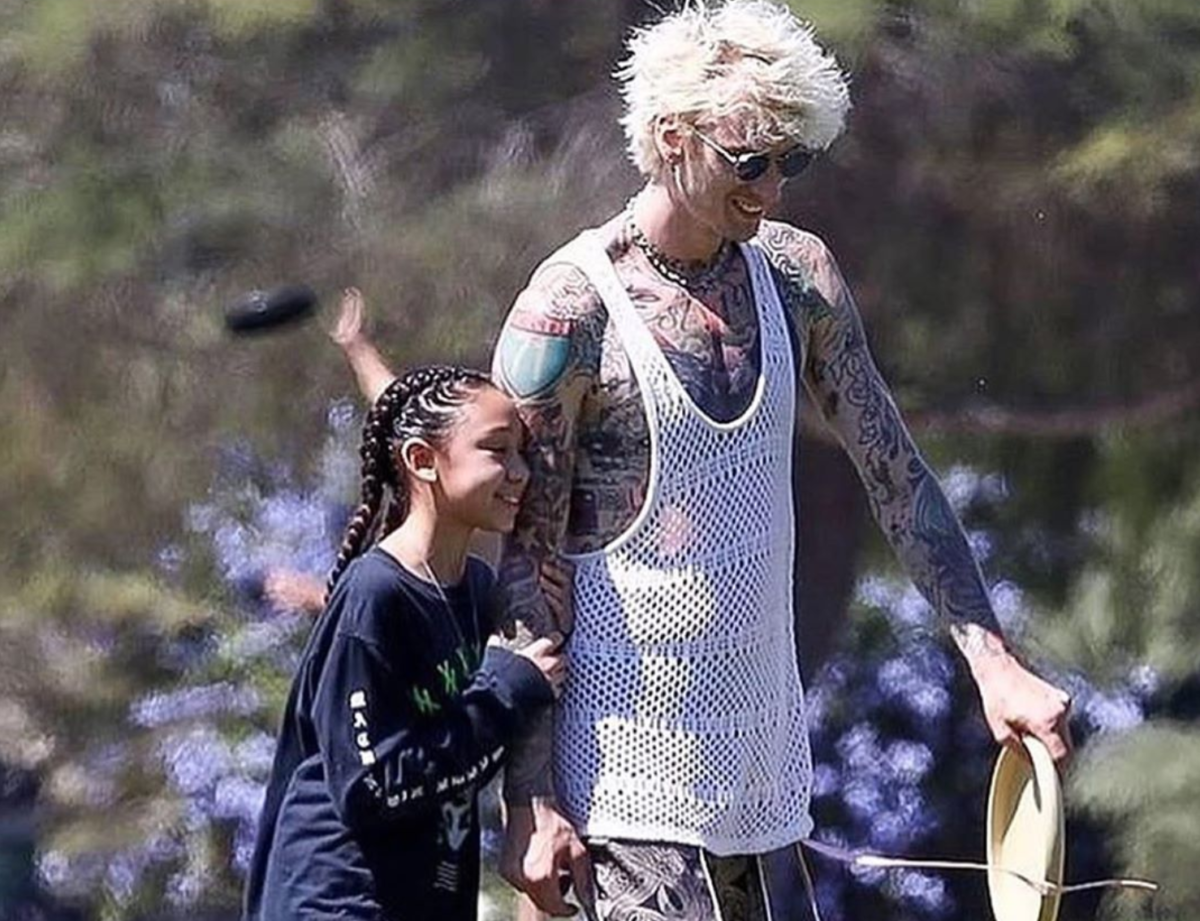 machine gun kelly steps away to process loss of father 