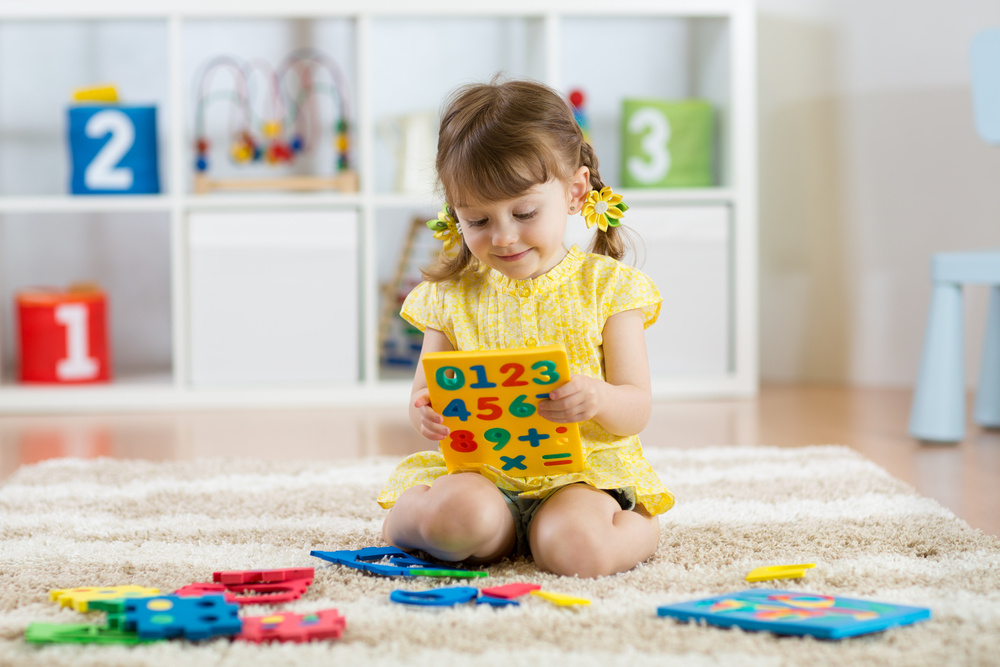 my husband and i disagree about how many toys we should buy our kid: advice?