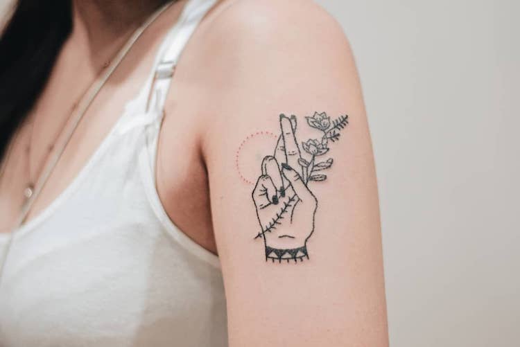 25 good luck tattoos that will charm your life
