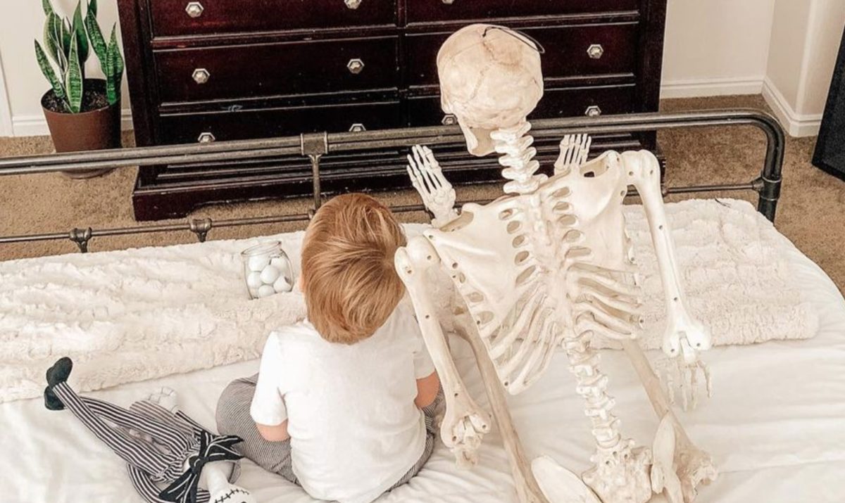 toddler brings skeleton bff everywhere and it's spooky sweet 