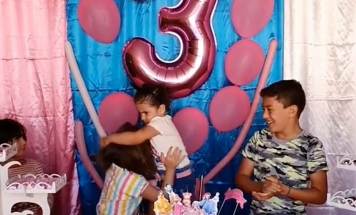 aunt says that's just how sisters are after video of little sister beating up her older sister for blowing out her birthday candles goes viral