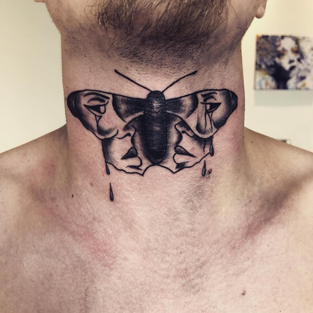 25 Daring Throat Tattoos
