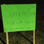 Kids Dump Some of Their Halloween Candy In Front of Child With Cancer Sign So That He Can Enjoy the Goodness Too
