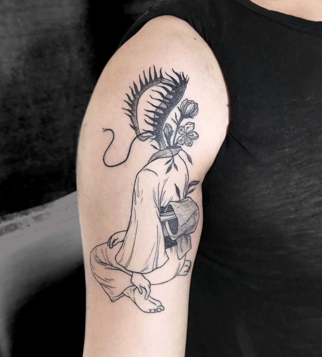 25 surrealism tattoos that will bend your mind