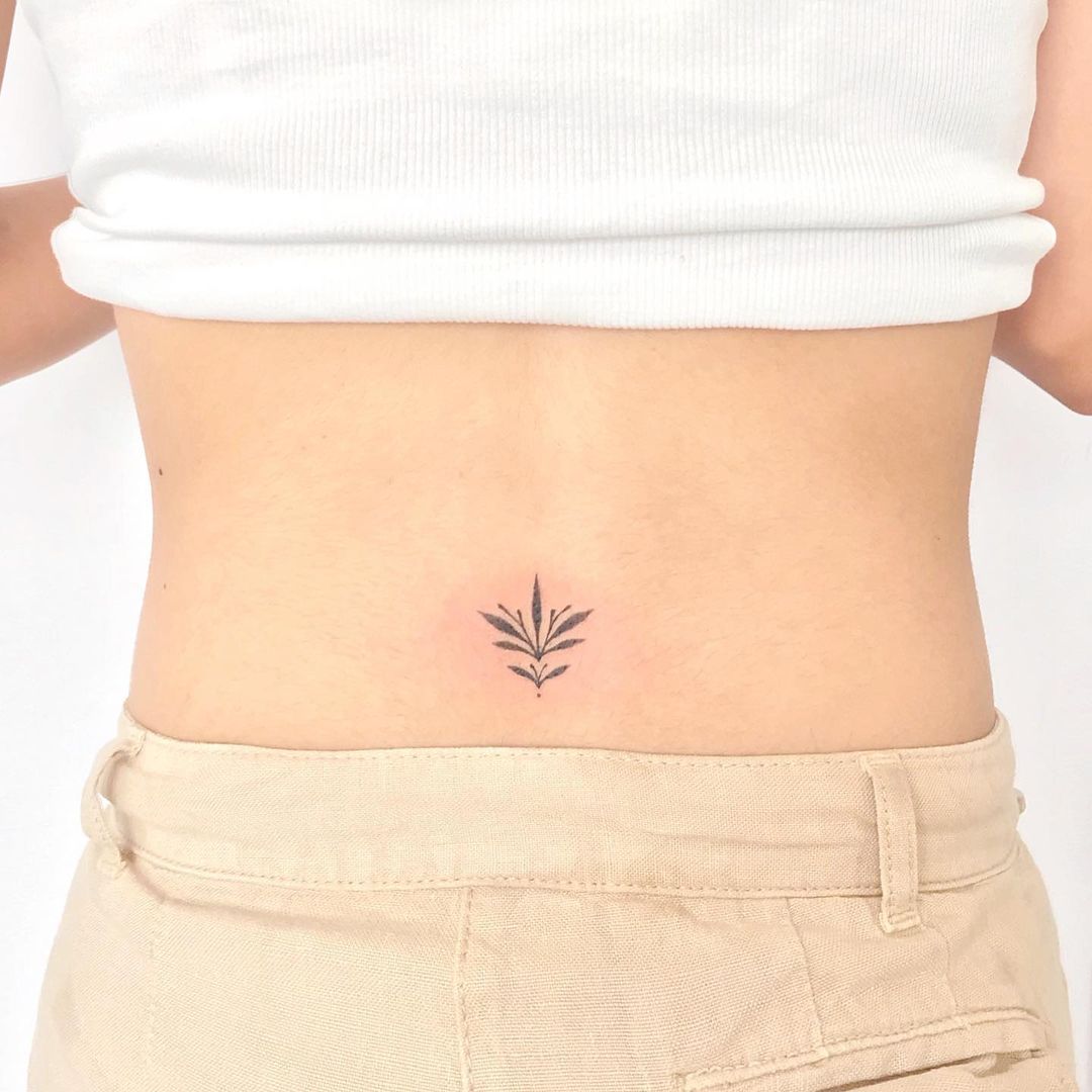 25 lower back tattoos that upset taboo and reclaim a fabulous look