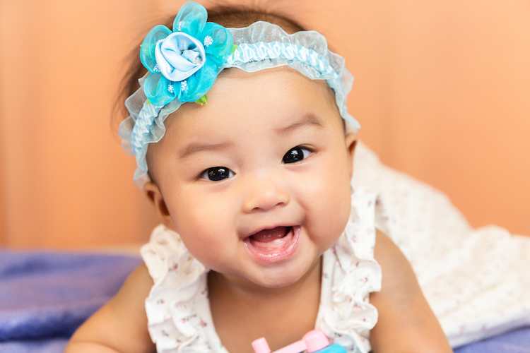 25 Joyous Baby Names for Girls That Mean 'Happy' from a Variety of Traditions 