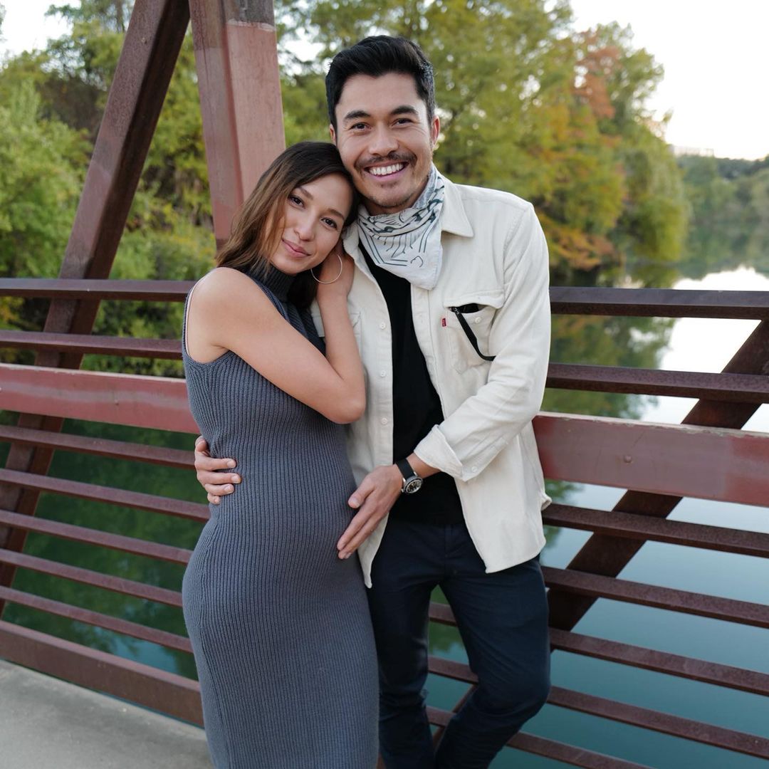 Henry Golding and Liv Lo Welcome First Baby Together & Share Adorable Picture | Henry Golding and his wife, Liv Lo, said, "or lives changed forever" after the arrival of their first baby together!