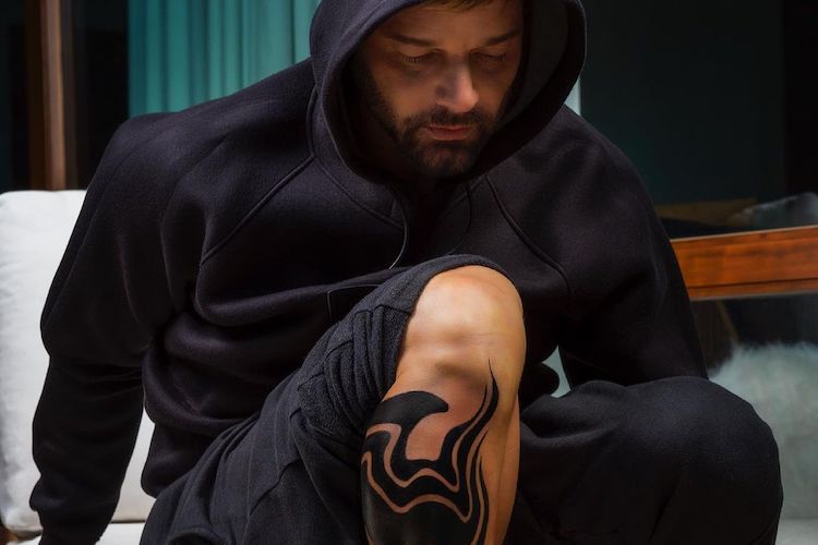ricky martin & adam levine both got massive leg tattoos, check out their new ink and more like it