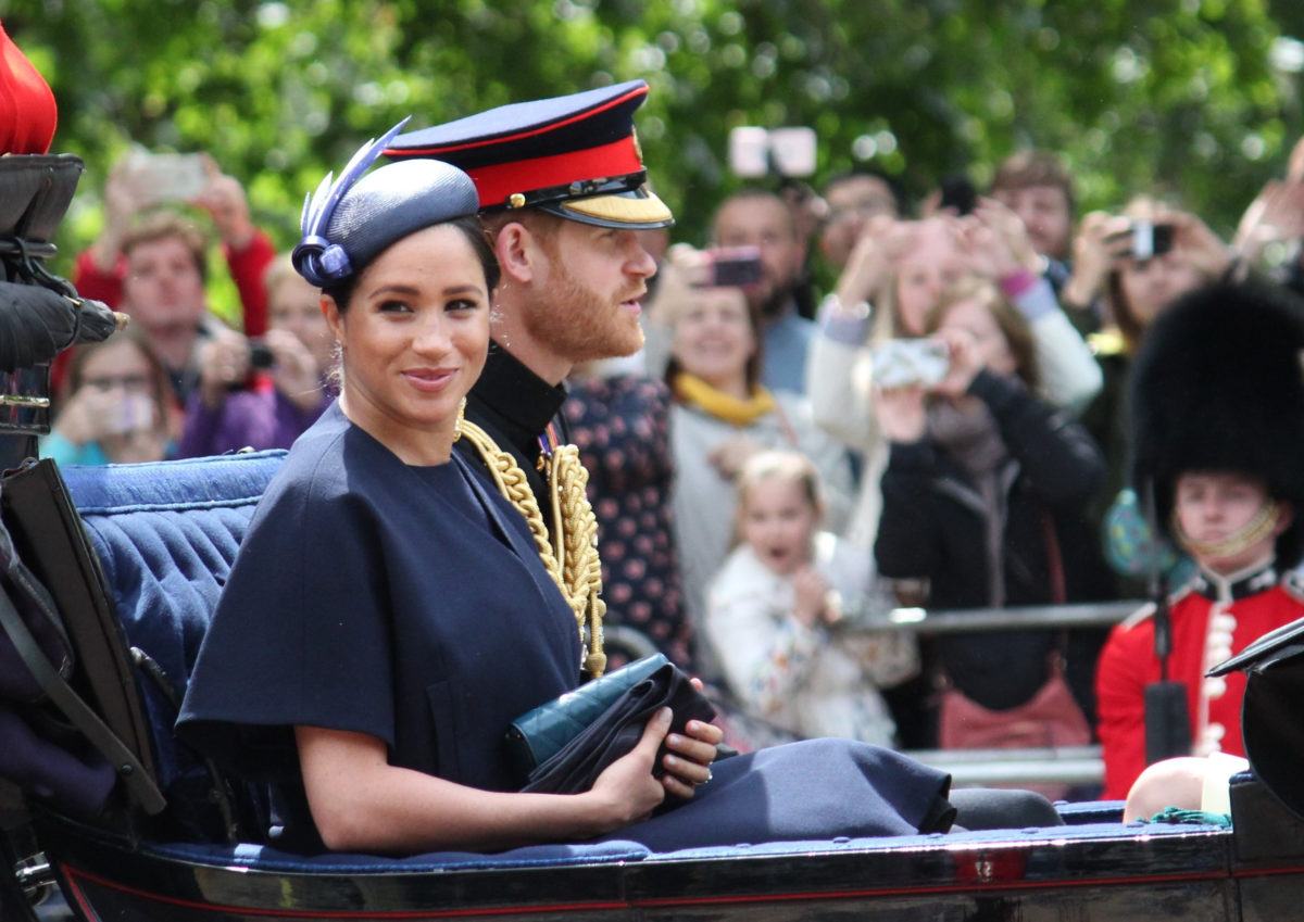 new book allegedly reveals the identity of the royal family member who questioned prince harry and meghan markle's baby's skin color