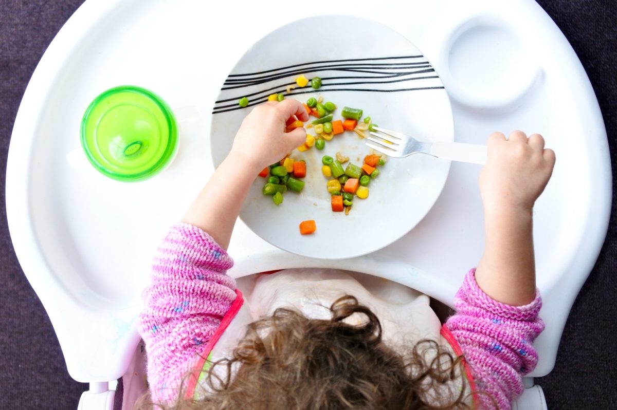 does your toddler adore feeding you? experts weigh in on why