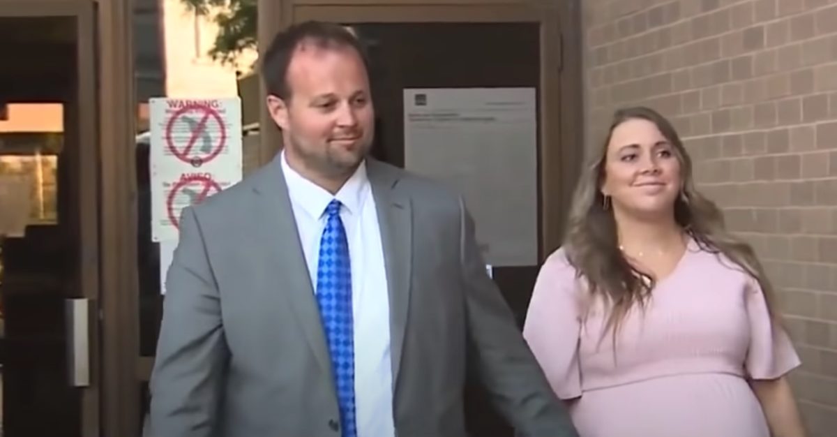 Josh Duggar and a Pregnant Anna Duggar Seen Holding Hands and Smiling Walking Out of a Courtroom
