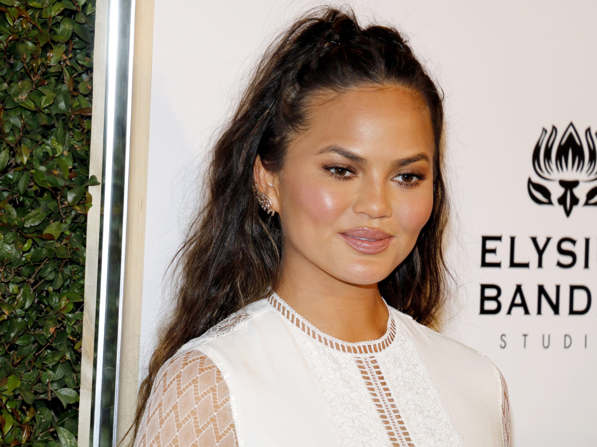chrissy teigen announces she's resumed ivf and wants fans to 'stop asking if i'm pregnant'
