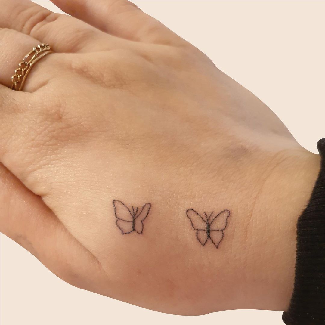 55 Butterfly Hand Tattoo