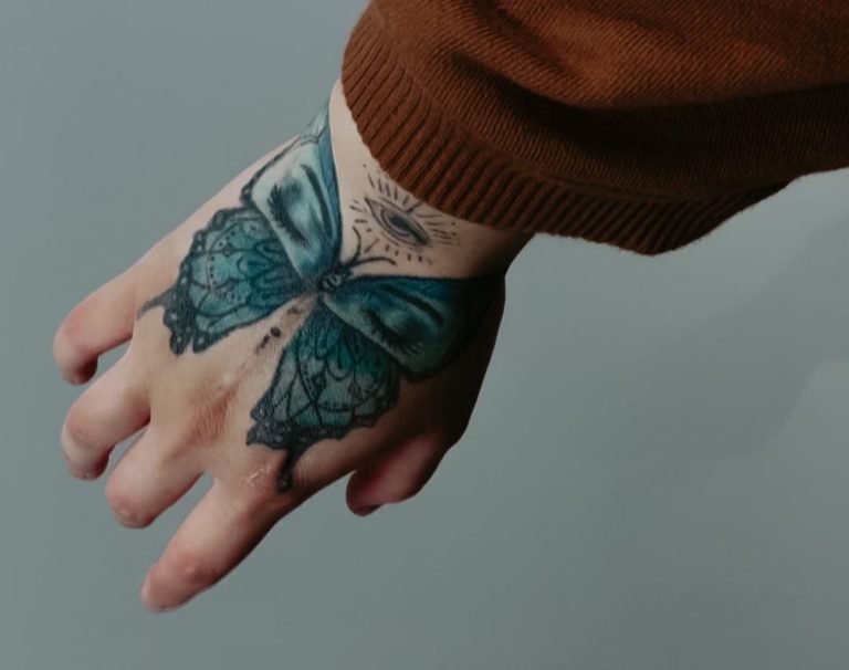 Butterfly Hand Tattoos - wide 1