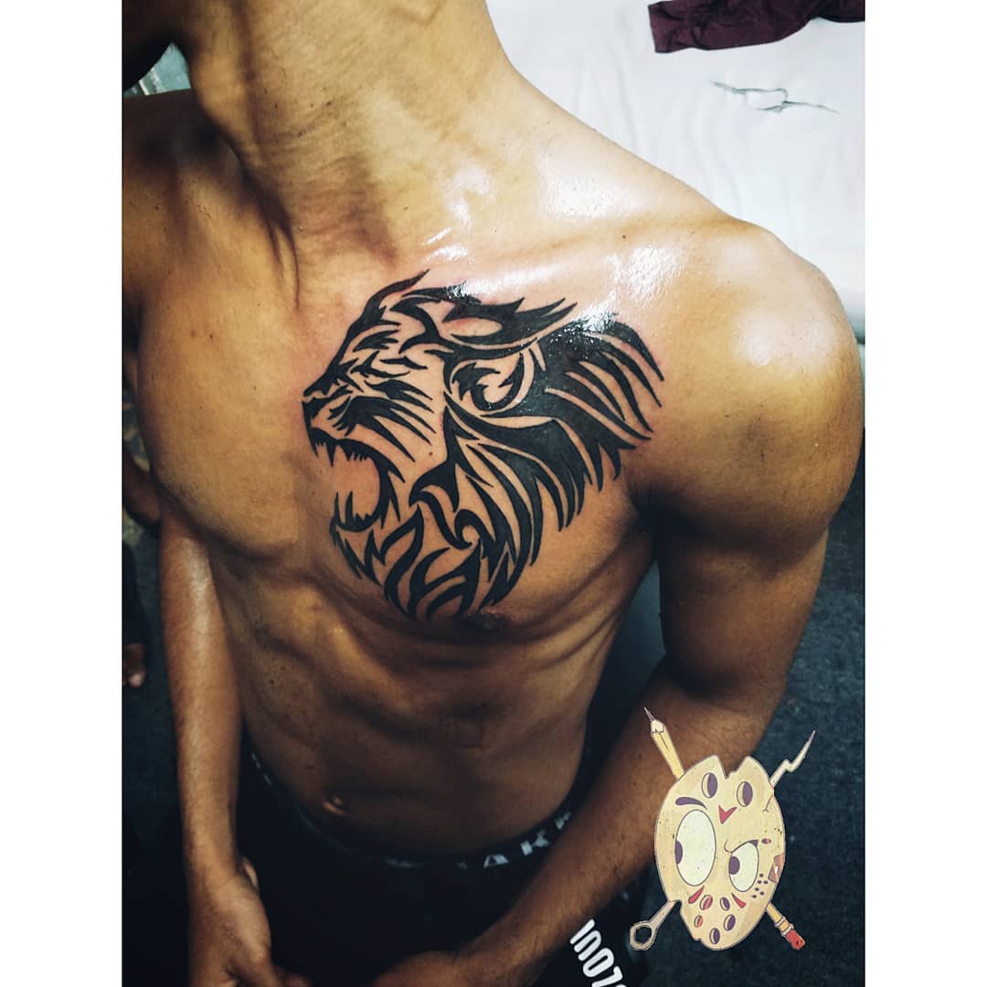 25 lion chest tattoo ideas that are fierce af