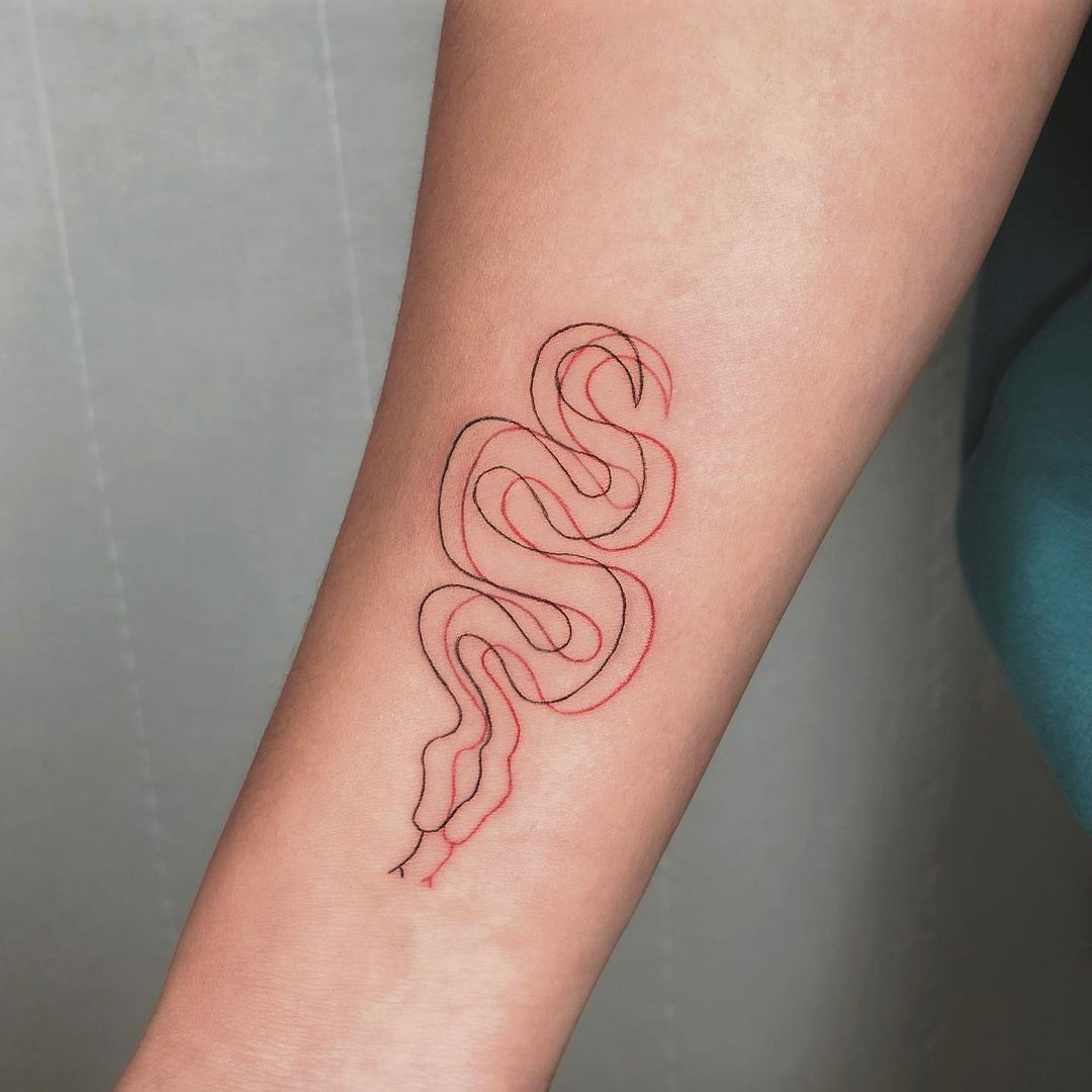 25 Stellar Ouroboros Tattoos That Symbolize Infinity and Look Amazing | Ouroboros Tattoos are symbols of wholeness and infinity. Discover the best designs featuring them.