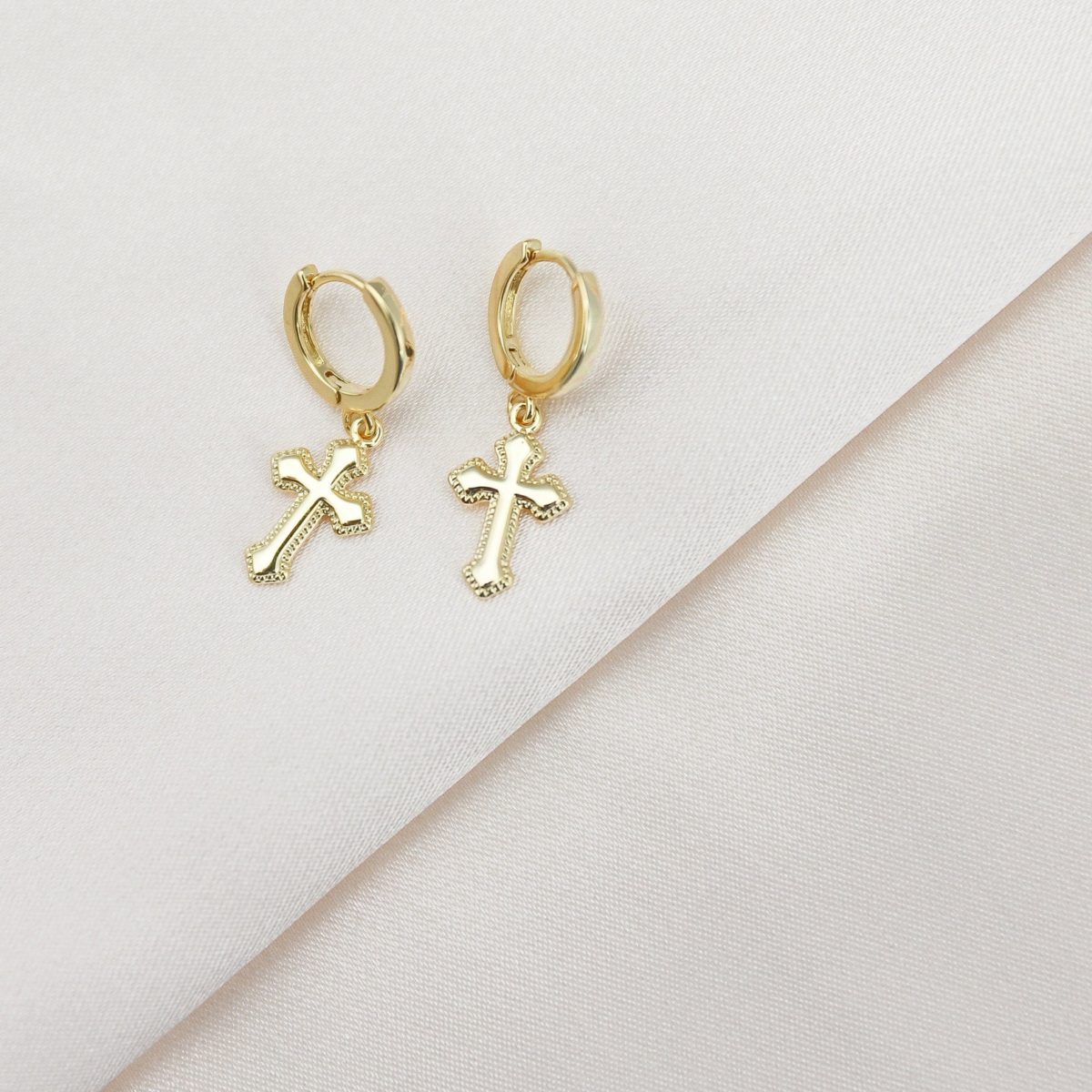 discover the perfect pair of cross earrings