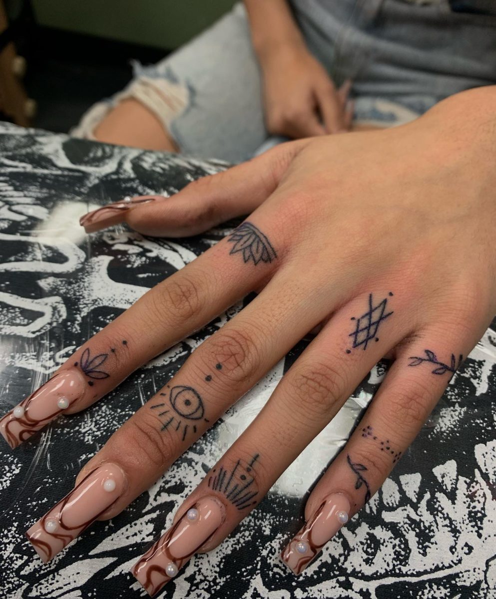 Lewis Hamilton's New Hand Tattoos 