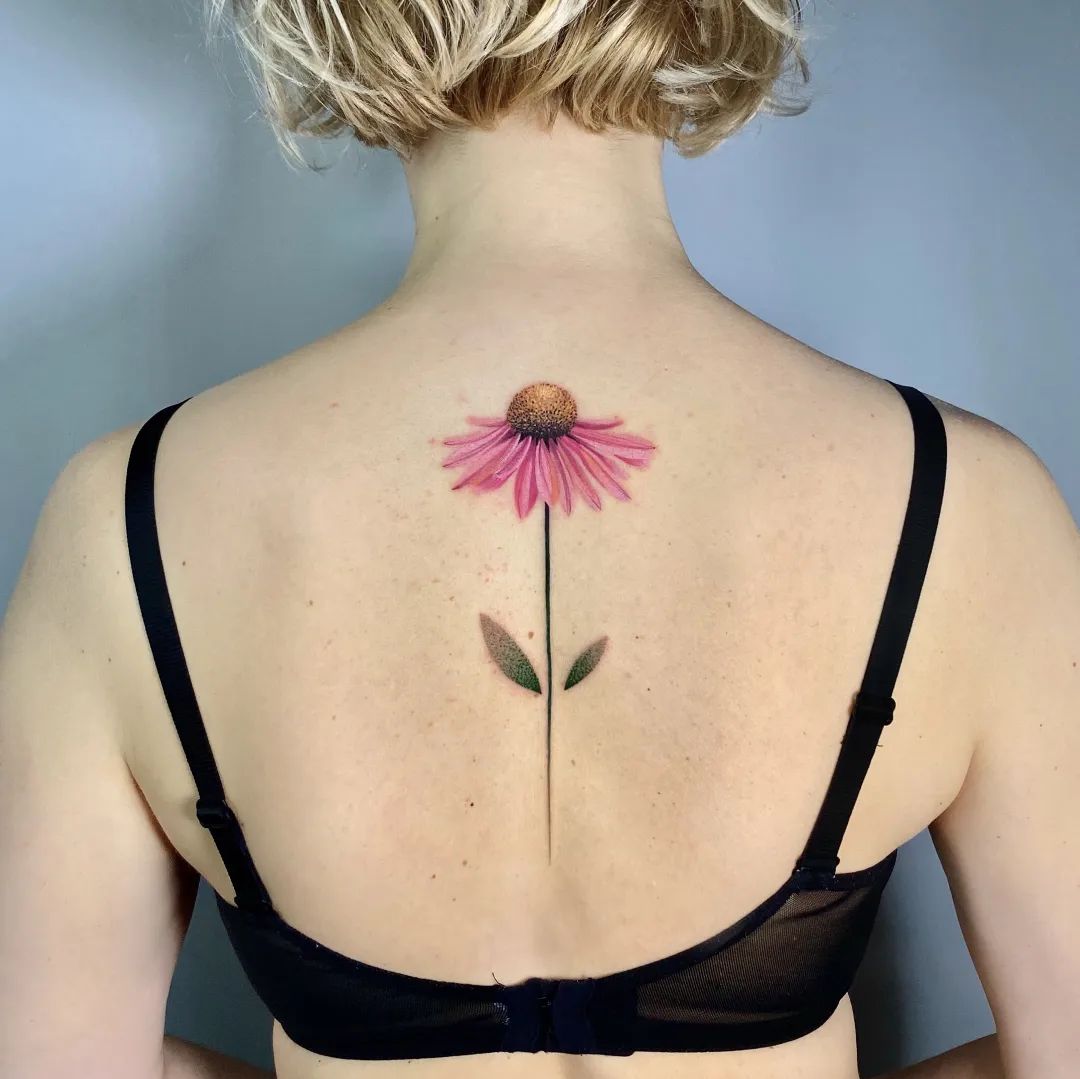 25 elegant back tattoos for women