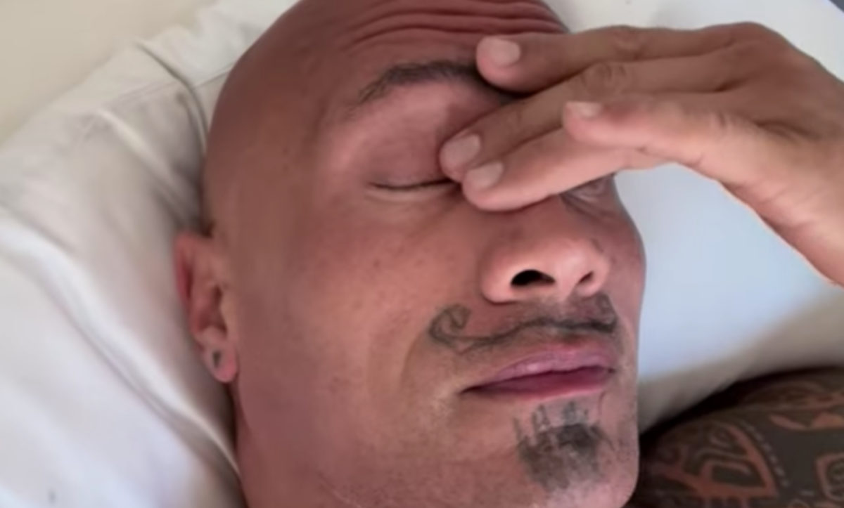 dwayne johnson lets his daughters draw on his face while he pretends to sleep