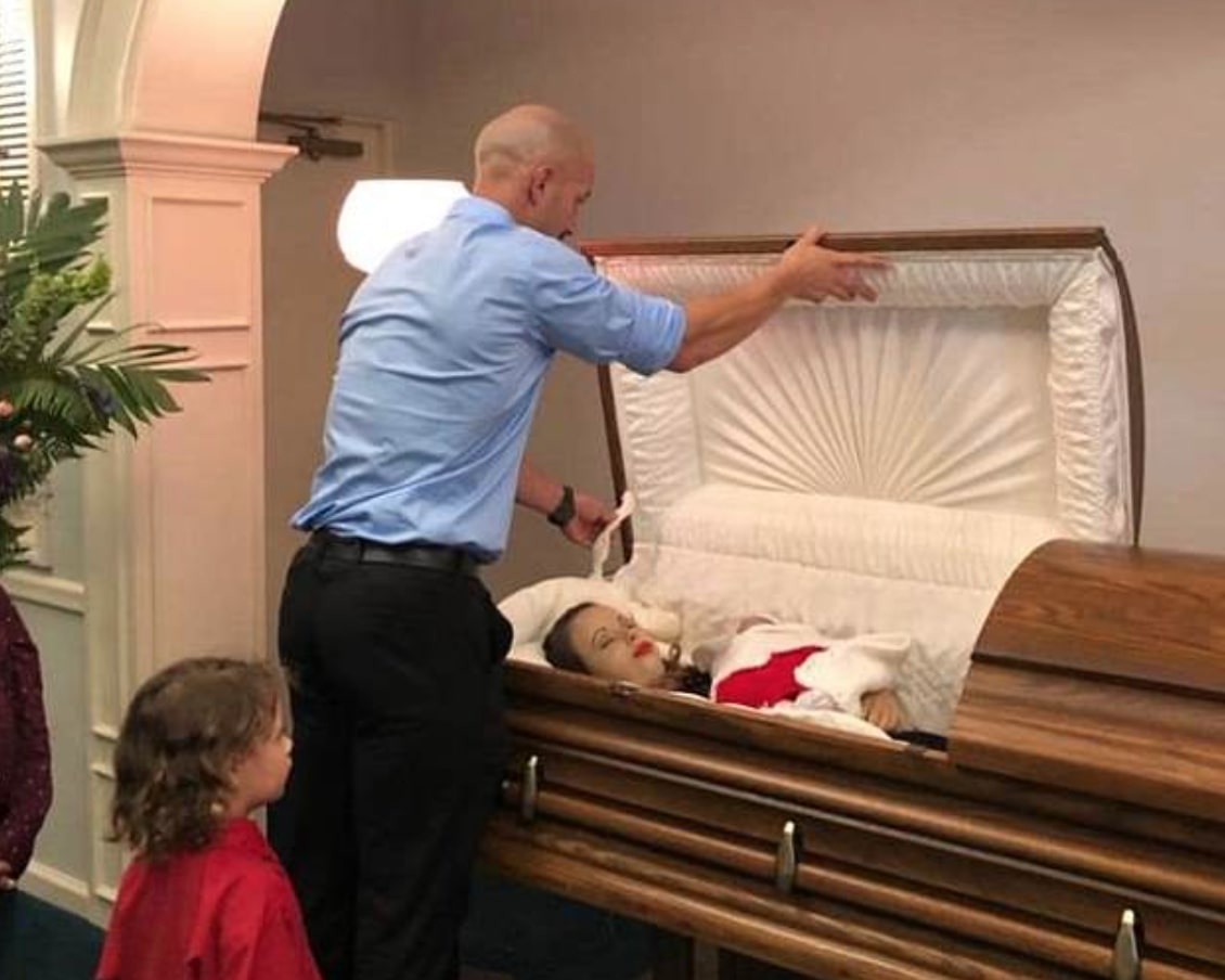 father posts photos of deceased wife and child in an open casket to raise awareness around drunk driving