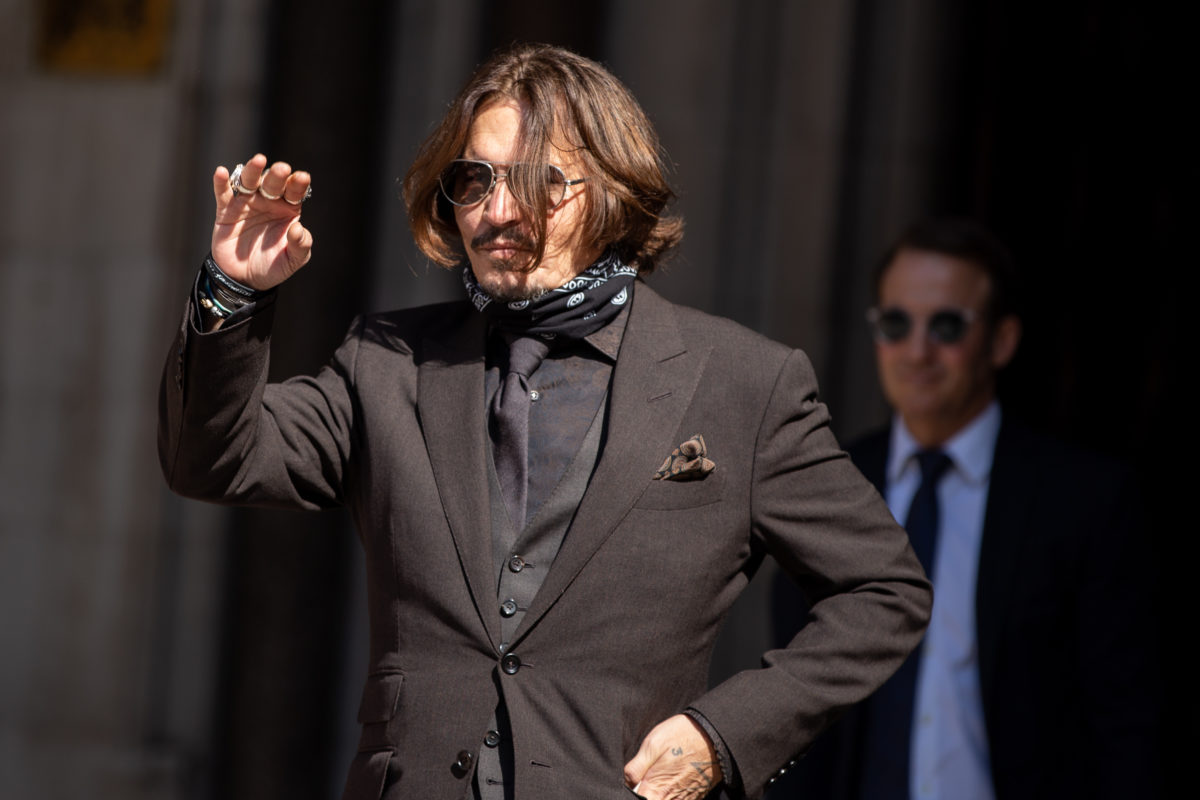 Johnny Depp First Pumps and Cheers While In The UK Over Defamation Verdict