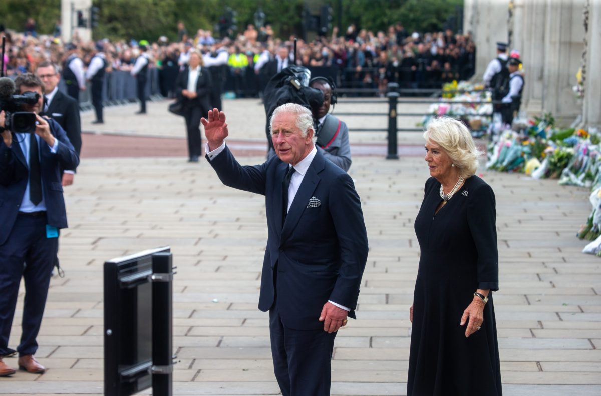 King Charles III and Queen Camilla Appear Unfazed as Protester Launches Five Eggs in Their Direction