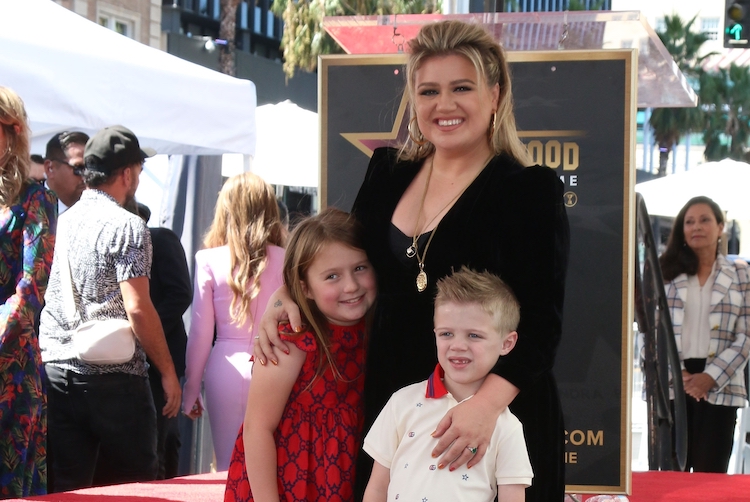 kelly clarkson reveals kids are still reeling from brandon blackstock divorce: 'i wish mommy and daddy were in the same house' | "i am raising very independent children," kelly clarkson said of parenting after divorce.