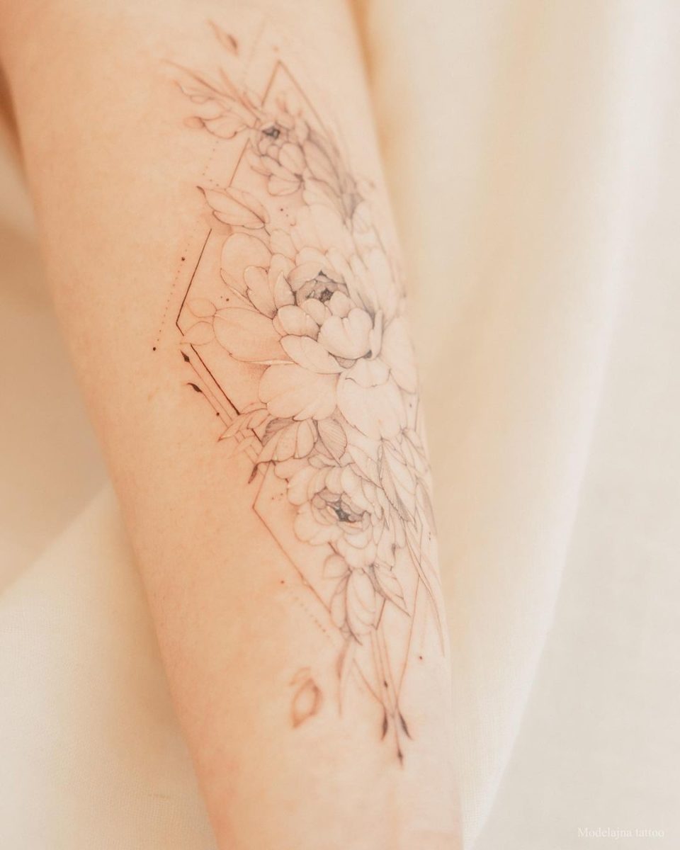 Carrie Underwood Just Got a Sweet Vacation Tattoo: Take a Look and Get Inspired by It and Other Delicate Designs | Carrie Underwood just got a flower tattoo to commemorate a vacation with her girlfriends. Check it out along with others like it.