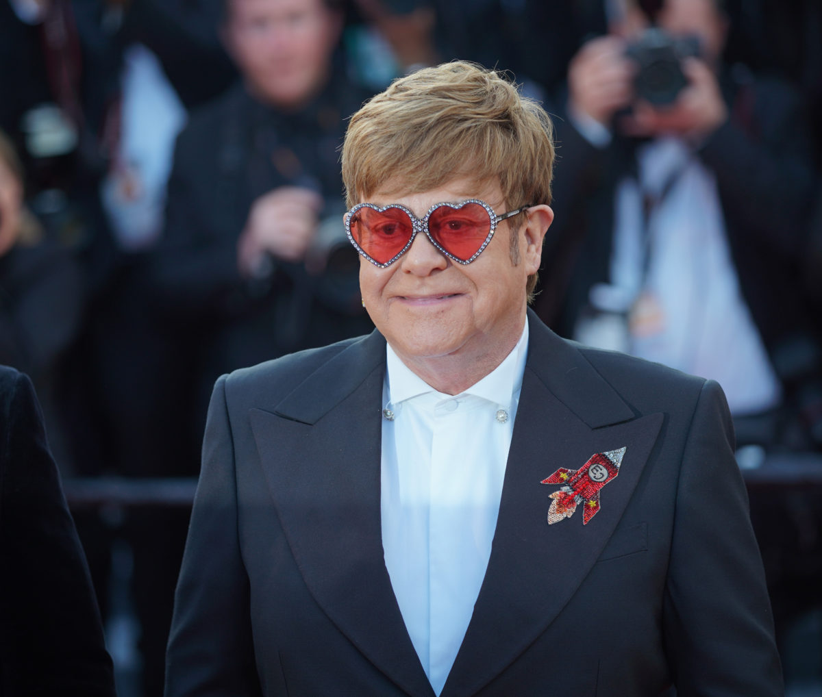 Sir Elton John, 76, Hospitalized After Suffering a Fall | Retirement has gotten off to a rocky start for Elton John. Reports are offering an update on Sir John Elton after he was rushed to the hospital last night.