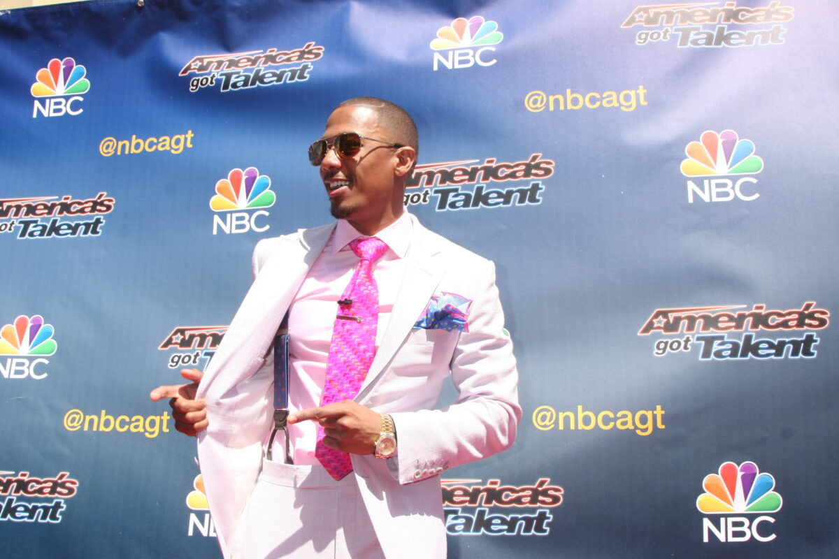 nick cannon wearing white suit